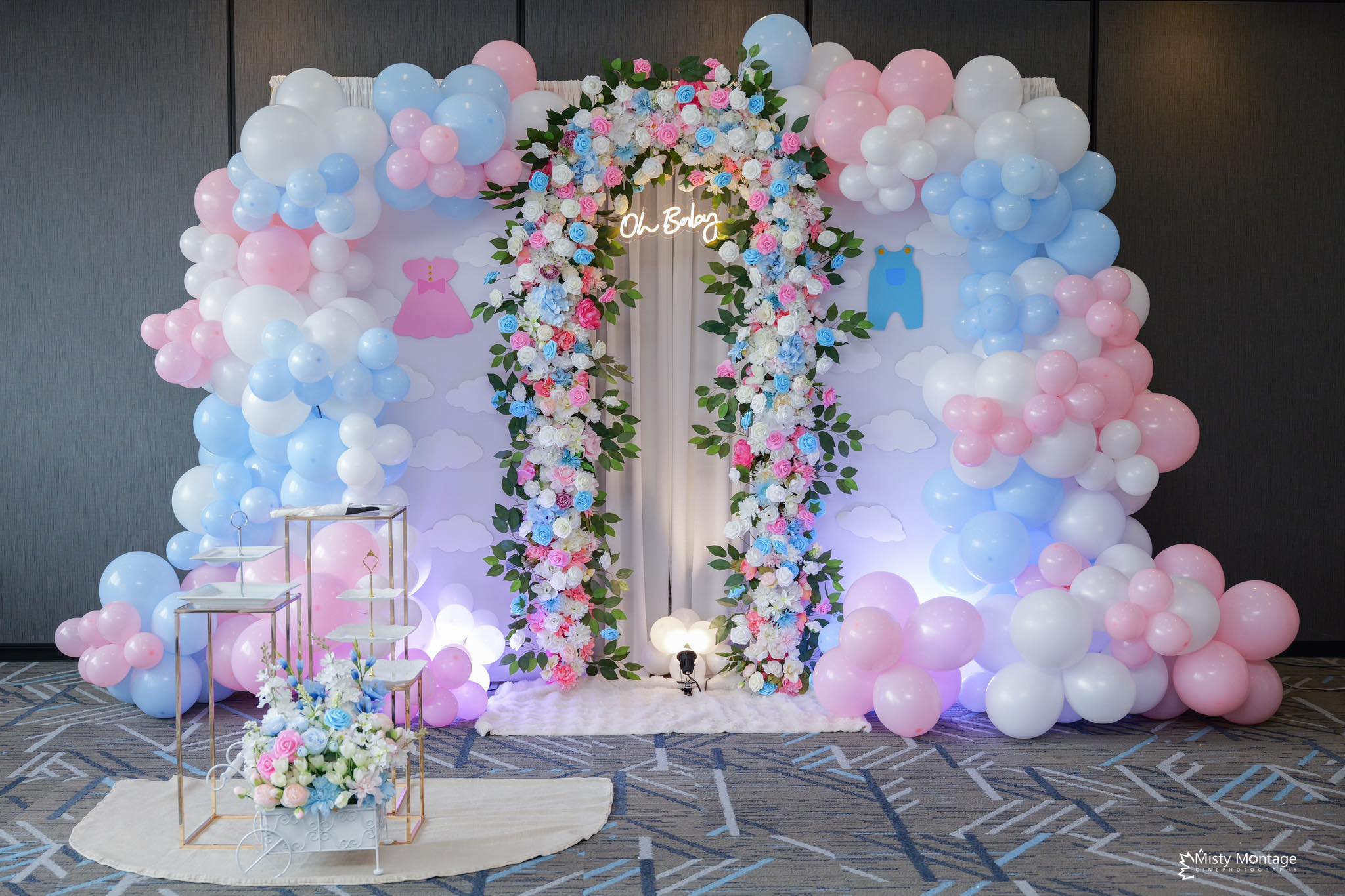 Baptism ceremony — white and rose flower arch with drapes