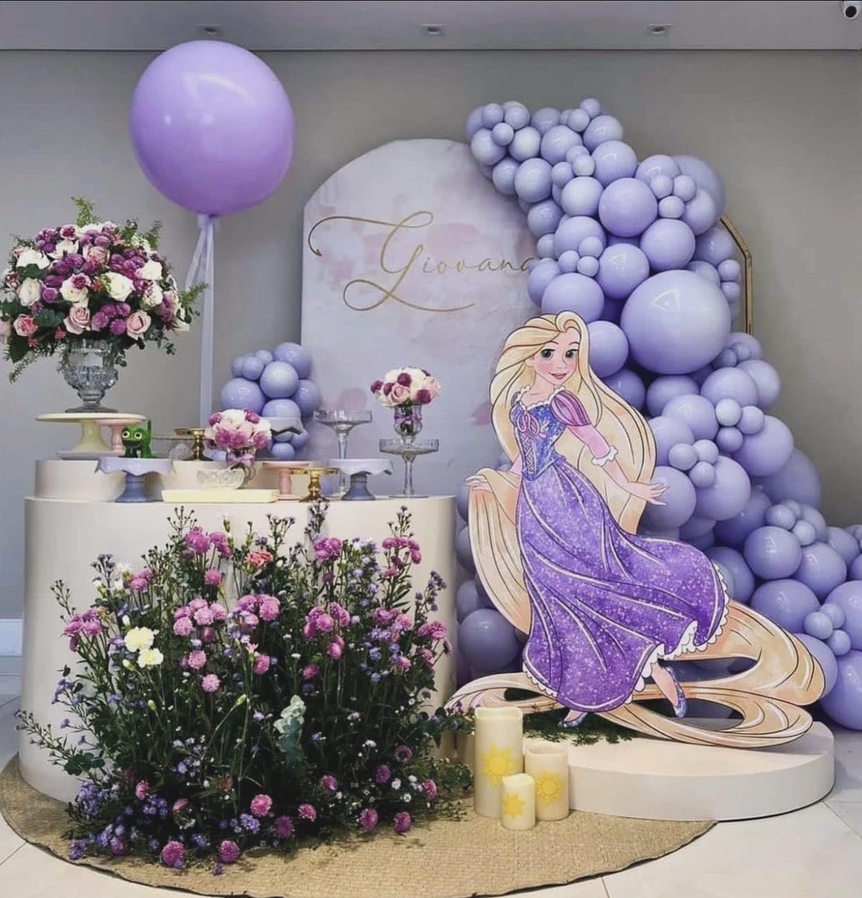 Winter ONEderland birthday — blue, silver, and white balloon arch